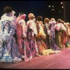 Male dancers in drag wearing hyper-ruffled costumes in a scene from the Broadway musical "La Cage Aux Folles." (New York)