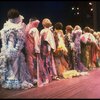 Male dancers in drag wearing hyper-ruffled costumes in a scene from the Broadway musical "La Cage Aux Folles." (New York)