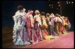 Male dancers in drag wearing hyper-ruffled costumes in a scene from the Broadway musical "La Cage Aux Folles." (New York)