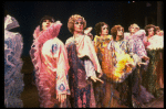 Male dancers in drag wearing hyper-ruffled costumes in a scene from the Broadway musical "La Cage Aux Folles." (New York)