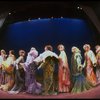 Male dancers in drag wearing hyper-ruffled costumes in a scene from the Broadway musical "La Cage Aux Folles." (New York)