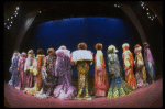 Male dancers in drag wearing hyper-ruffled costumes in a scene from the Broadway musical "La Cage Aux Folles." (New York)