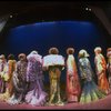 Male dancers in drag wearing hyper-ruffled costumes in a scene from the Broadway musical "La Cage Aux Folles." (New York)