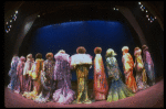 Male dancers in drag wearing hyper-ruffled costumes in a scene from the Broadway musical "La Cage Aux Folles." (New York)