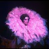 Male dancers in drag wearing hyper-ruffled costumes in a scene from the Broadway musical "La Cage Aux Folles." (New York)