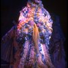 Male dancers in drag wearing hyper-ruffled costumes in a scene from the Broadway musical "La Cage Aux Folles." (New York)