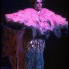 Male dancers in drag wearing hyper-ruffled costumes in a scene from the Broadway musical "La Cage Aux Folles." (New York)