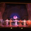 Male dancers in drag wearing hyper-ruffled costumes in a scene from the Broadway musical "La Cage Aux Folles." (New York)