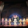 Male dancers in drag wearing hyper-ruffled costumes in a scene from the Broadway musical "La Cage Aux Folles." (New York)