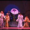 Male dancers in drag wearing hyper-ruffled costumes in a scene from the Broadway musical "La Cage Aux Folles." (New York)