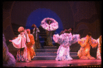 Male dancers in drag wearing hyper-ruffled costumes in a scene from the Broadway musical "La Cage Aux Folles." (New York)