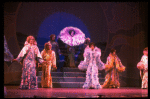 Male dancers in drag wearing hyper-ruffled costumes in a scene from the Broadway musical "La Cage Aux Folles." (New York)