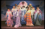 Male dancers in drag wearing hyper-ruffled costumes in a scene from the Broadway musical "La Cage Aux Folles." (New York)