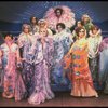 Male dancers in drag wearing hyper-ruffled costumes in a scene from the Broadway musical "La Cage Aux Folles." (New York)