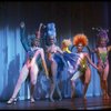 Male dancers in drag wearing bird-style costumes in a scene from the Broadway musical "La Cage Aux Folles." (New York)