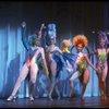 Male dancers in drag wearing bird-style costumes in a scene from the Broadway musical "La Cage Aux Folles." (New York)