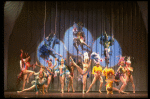 Male dancers in drag wearing bird-style costumes in a scene from the Broadway musical "La Cage Aux Folles." (New York)