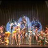 Male dancers in drag wearing bird-style costumes in a scene from the Broadway musical "La Cage Aux Folles." (New York)