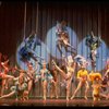 Male dancers in drag wearing bird-style costumes in a scene from the Broadway musical "La Cage Aux Folles." (New York)