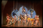 Male dancers in drag wearing bird-style costumes in a scene from the Broadway musical "La Cage Aux Folles." (New York)