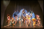 Male dancers in drag wearing bird-style costumes in a scene from the Broadway musical "La Cage Aux Folles." (New York)