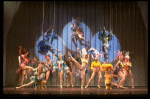 Male dancers in drag wearing bird-style costumes in a scene from the Broadway musical "La Cage Aux Folles." (New York)