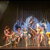 Male dancers in drag wearing bird-style costumes in a scene from the Broadway musical "La Cage Aux Folles." (New York)