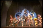Male dancers in drag wearing bird-style costumes in a scene from the Broadway musical "La Cage Aux Folles." (New York)