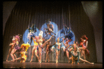Male dancers in drag wearing bird-style costumes in a scene from the Broadway musical "La Cage Aux Folles." (New York)