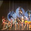 Male dancers in drag wearing bird-style costumes in a scene from the Broadway musical "La Cage Aux Folles." (New York)