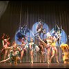 Male dancers in drag wearing bird-style costumes in a scene from the Broadway musical "La Cage Aux Folles." (New York)