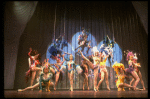 Male dancers in drag wearing bird-style costumes in a scene from the Broadway musical "La Cage Aux Folles." (New York)