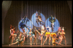 Male dancers in drag wearing bird-style costumes in a scene from the Broadway musical "La Cage Aux Folles." (New York)