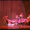 Male dancers in drag wearing Folies Bergere costumes in a scene from the Broadway musical "La Cage Aux Folles." (New York)