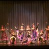 Male dancers in drag wearing Folies Bergere costumes in a scene from the Broadway musical "La Cage Aux Folles." (New York)