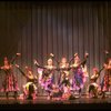 Male dancers in drag wearing Folies Bergere costumes in a scene from the Broadway musical "La Cage Aux Folles." (New York)