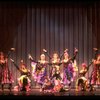 Male dancers in drag wearing Folies Bergere costumes in a scene from the Broadway musical "La Cage Aux Folles." (New York)