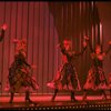 Male dancers in drag wearing Folies Bergere costumes in a scene from the Broadway musical "La Cage Aux Folles." (New York)