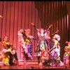 Male dancers in drag wearing Folies Bergere costumes in a scene from the Broadway musical "La Cage Aux Folles." (New York)