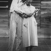 Actors wearing masks in a scene from the NY Shakespeare Festival production of the play "Spunk"