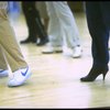 Legs of co-choreographer and director Michael Bennett (C) working w. cast during rehearsal for the Broadway musical "Dreamgirls." (New York)