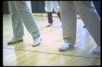Legs of co-choreographer and director Michael Bennett (C) working w. cast during rehearsal for the Broadway musical "Dreamgirls." (New York)