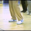 Legs of co-choreographer and director Michael Bennett (C) working w. cast during rehearsal for the Broadway musical "Dreamgirls." (New York)