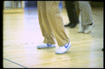 Legs of co-choreographer and director Michael Bennett (C) working w. cast during rehearsal for the Broadway musical "Dreamgirls." (New York)