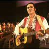 Mark Syers as Augustin Magaldi (R) and Patti LuPone as Eva Peron (L) in a scene from the Broadway musical "Evita." (New York)