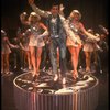 Lee Roy Reams (C) performing "We're In The Money" in a scene from the Broadway production of the musical "42nd Street." (New York)