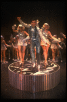 Lee Roy Reams (C) performing "We're In The Money" in a scene from the Broadway production of the musical "42nd Street." (New York)