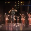 Lee Roy Reams (C) performing "We're In The Money" in a scene from the Broadway production of the musical "42nd Street." (New York)