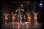 Lee Roy Reams (C) performing "We're In The Money" in a scene from the Broadway production of the musical "42nd Street." (New York)