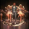 Lee Roy Reams (C) performing "We're In The Money" in a scene from the Broadway production of the musical "42nd Street." (New York)